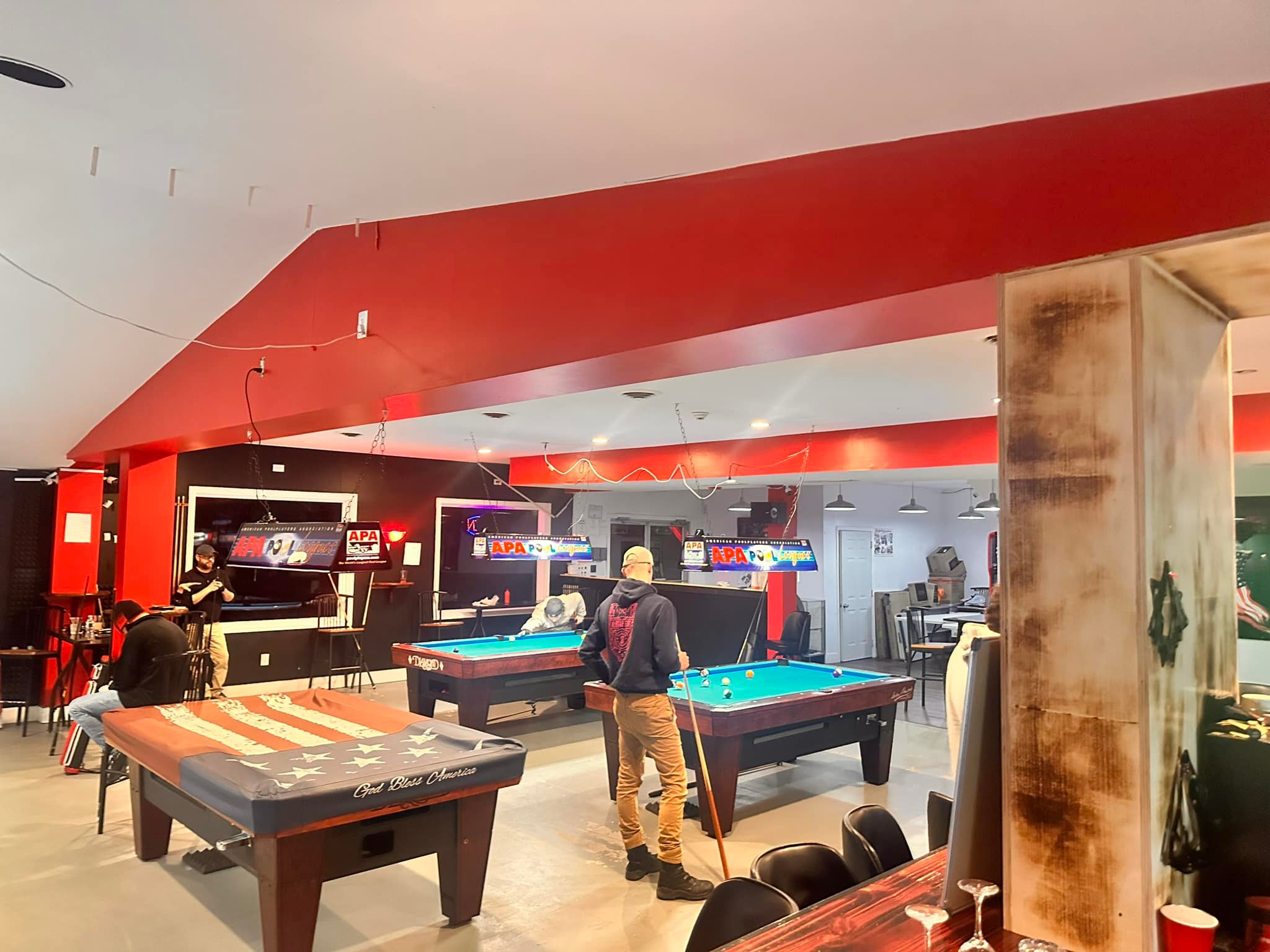 Players at a pool table